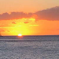 Joe Rudzyn entered this photo taken at sunset at Waikiki beach.