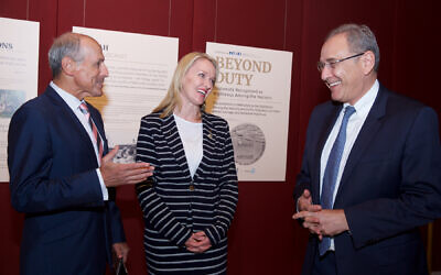 From left: Vic Alhadeff, Natalie Ward and Mark Sofer at the opening of the Beyond Duty exhibition at NSW Parliament House. Photo: Giselle Haber