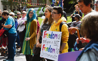 Protesters outside the State Library of Victoria on Sunday, February 9. Photo: AAP Image/James Ross