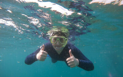 Shaanan Morris snorkelling in the Whitsundays