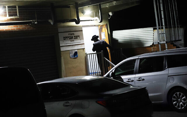 One of several men seen entering the synagogue for a minyan earlier this week.