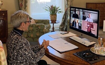 Victorian Governor Linda Dessau virtually invests Bella Hirshorn (bottom left corner of screen) with her AM in the
state’s first ever online investiture last week.