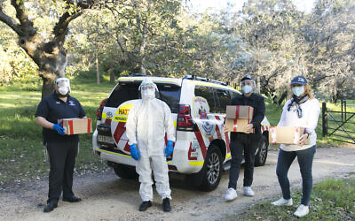 SmartAID volunteers delivering PPE to Hatzolah Sydney. Photo: Nadine Saacks