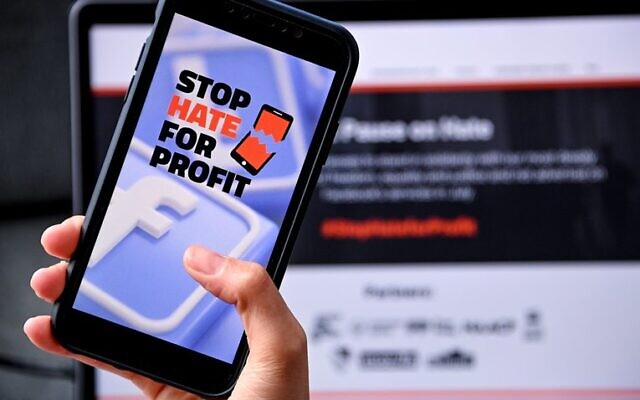 Companies are boycotting Facebook and demanding the platform take stronger measures to weed out hateful
content. Photo: EPA/Sascha Steinbach