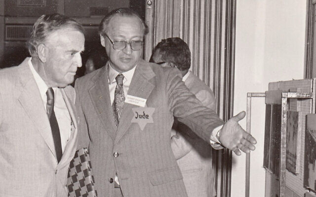 Queensland-based Shoah survivor George Stein shows former premier Joh Bjelke-Petersen around the temporary
Holocaust exhibition in 1982.
