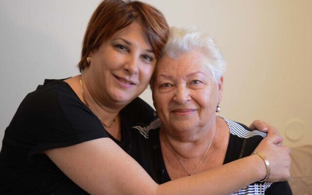 A resident and their carer at Amigour Sheltered Housing in Israel.