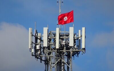 A Nazi flag attached to a phone tower in the the Victorian town of Kyabram last April.
Photo: Twitter