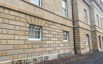 The graffiti scrawled on a wall of
Parliament House in Tasmania last
week.