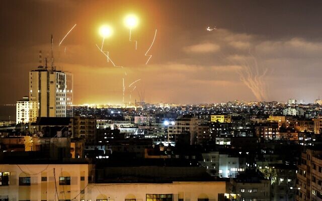 Rockets fired towards Israel from Gaza City are intercepted by Israel's Iron Dome Aerial Defence System on May 10, 2021. (Photo by MAHMUD HAMS / AFP)
