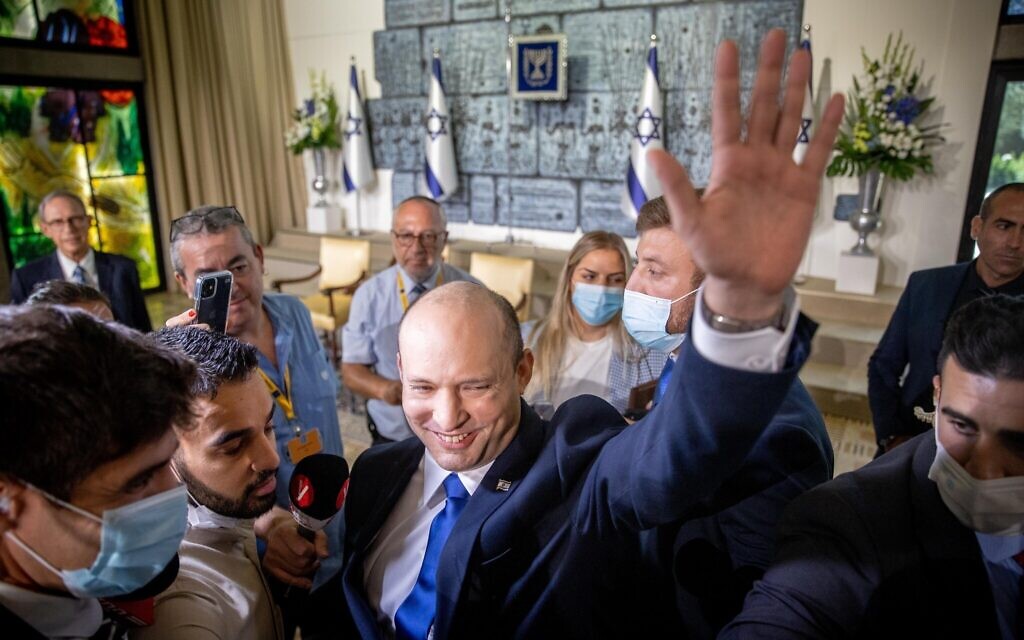 New Israeli Prime Minister Naftali Bennett waves at the President’s Residence in Jerusalem on June 14, 2021. Photo: Yonatan Sindel/Flash 90
