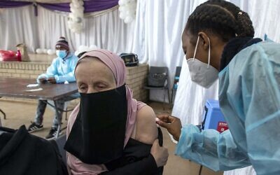 A teacher receiving a vaccination in South Africa last month.
Photo: AP Photo/Themba Hadebe