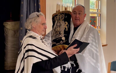 Walt Secord (right) with Rabbi Jeffrey Kamins at his naming ceremony.
