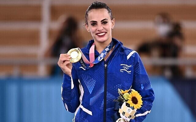 Israel's Linoy Ashram poses with her gold medal. Photo: AFP