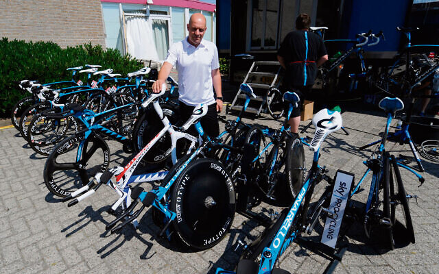 Sky Cycling Team Principal and Head of British Cycling Dave Brailsford checks the Sky Teams bikes in Rotterdam during the Tour de France preview day in Rotterdam ahead of the race. Photo: John Giles/PA Wire.
