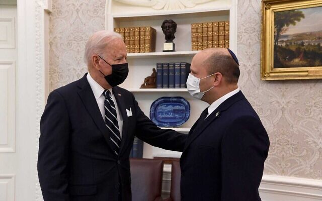 Israeli Prime Minister Naftali Bennett (right) speaks as he meets with US President Joe Biden in the Oval Office of the White House on Friday, August 27. Photo: GPO