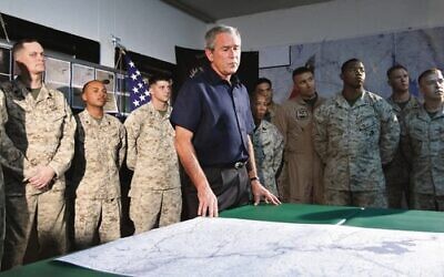 President George W. Bush with US troops at Al-Asad Airbase in Iraq in September 2007. Photo: AP Photo