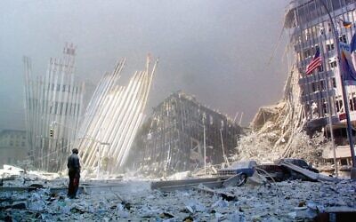A man stands in the rubble after the collapse of the first World Trade Centre Tower on September 11, 2001.  Photo: AFP Photo/Doug Kanter