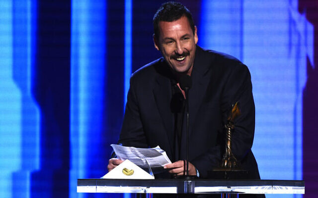 Adam Sandler accepts the award for best male lead for Uncut Gems at the 35th Film Independent Spirit Awards in 2020. Photo: AP Photo/Chris Pizzello