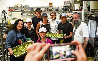 OBK teamed up with Le Cordon Bleu Australia to cook 1000 healthy meals for needy Australians. Photo: Le Cordon Bleu