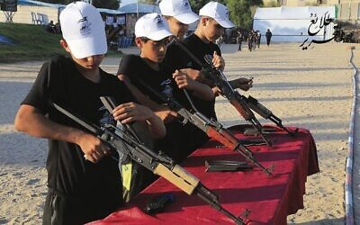 Gaza children trained in the use of weapons at a summer camp earlier this year. Photo: Hamas