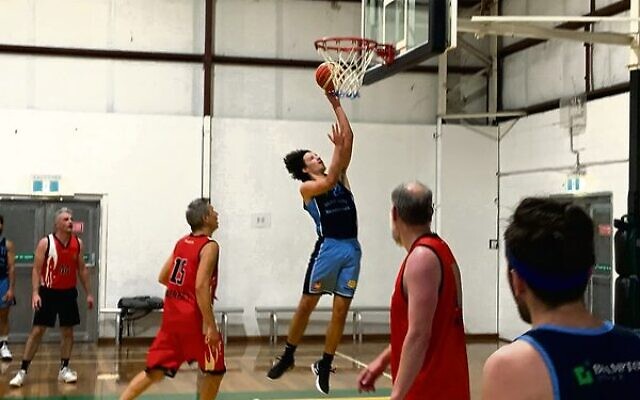 Zac Wein scores for the Maccabi Rockets men's Division 1 team on October 25 in the City of Sydney comp.