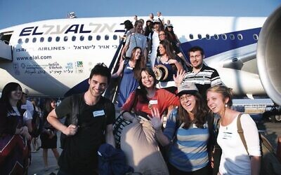 Passengers stepping off an El Al plane at Ben Gurion Airport. Photo: Sason Tiram