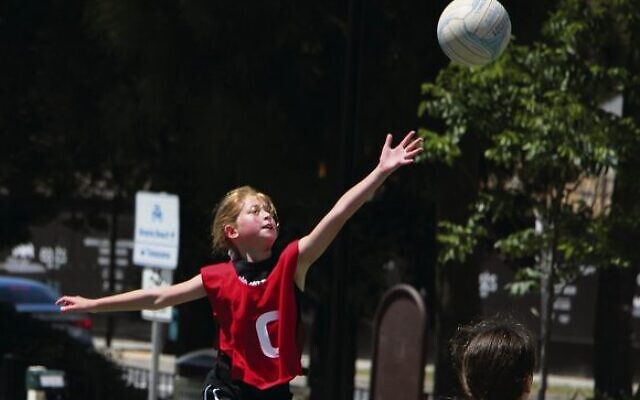 Marley Green leaps for the ball. Photos: Shane Desiatnik