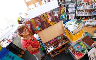 Lee Hirsh in her home studio with her winning artwork. Photo: Peter Haskin