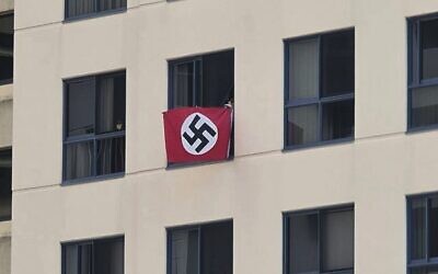 A Nazi flag flown from an apartment window overlooking Brisbane Synagogue in 2021. Photo: Reddit