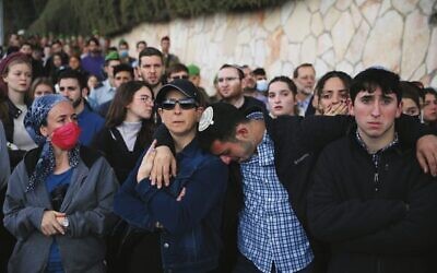 Mourners grieve at Eli Kay's funeral in Jerusalem.Photo: AP Photo/Oded Balilty