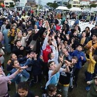 Crowds enjoy Dover Heights Shule's Chanukah in the Park.