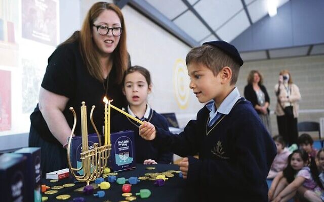 Chanukah candle lighting at The King David School with candles donated by The Joint. Photo: Peter Haskin
