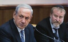 Benjamin Netanyahu (left) with Avichai Mandelblit in 2014. 
Photo: Yonatan Sindel/ Flash90