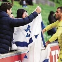 Tomer Hemed, playing for Wellington Phoenix, celebrates scoring a goal against Melbourne City with Jewish fans at AAMI Park. Tomer Hemed, playing for Wellington Phoenix, celebrates scoring a goal against Melbourne City with Jewish fans at AAMI Park.