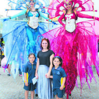 Mika (left) and Mali Hammerman (with mum Simone) and stilt walkers at Mount Sinai College's 40th anniversary celebrations. Mika (left) and Mali Hammerman (with mum Simone) and stilt walkers at Mount Sinai College's 40th anniversary celebrations.
