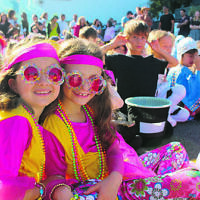 It's Purim time at Mount Sinai College with students Livia Ziegler (left) and Maya Isman. It's Purim time at Mount Sinai College with students Livia Ziegler (left) and Maya Isman.