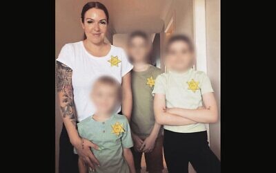 NSW anti-vaccination activist Sarah Mills and her children wearing yellow stars in an Instagram post last year.