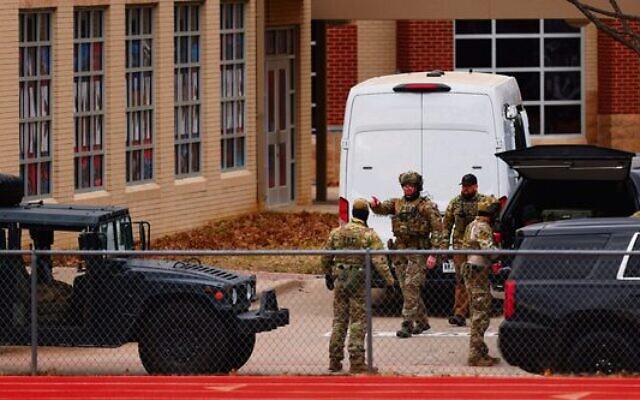 SWAT team members at Congregation Beth Israel synagogue in Colleyville, Texas on Sunday. 
Photo: Andy Jacobsohn/AFP via Getty Images