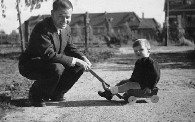 Alfred Goldsteen playing with young George in 1943.
