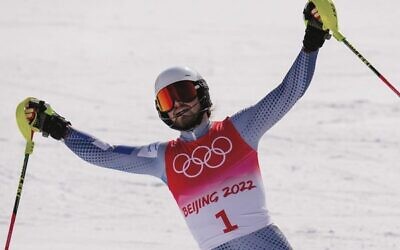 Israeli Barnabas Szollos celebrates coming sixth in his Winter Olympics skiing event. Photo: Luca Bruno
