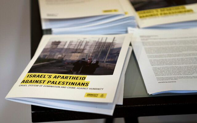 Copies of Amnesty International's report "Israel's Apartheid Against Palestinians".
Photo: AP Photo/Maya Alleruzzo