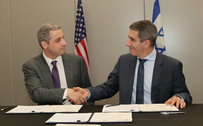 DHS Under Secretary for Strategy, Policy and Plans Robert Silvers, left, with Israel National Cyber Directorate Director-General Gaby Portnoy on March 2, 2022 in Jerusalem, after signing new cybersecurity collaboration agreements. (Eleonoa Shilova / Israel National Cyber Directorate)