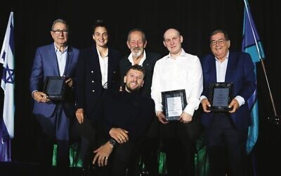Guest speaker Dylan Alcott (centre) with, from left: Hall of Fame inductees: David Smorgon (accepting for Dr Gary Zimmerman), Melissa Maizels, David Zuker, Alex Bogatyrev (accepting for Alexandra Kiroi-Bogatyreva) and Peter Kagan. Photos: Peter Haskin