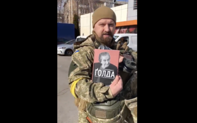 A Ukrainian soldier named Alex keeps Golda Meir's biography in his backpack. Photo: Screenshot from Twitter
