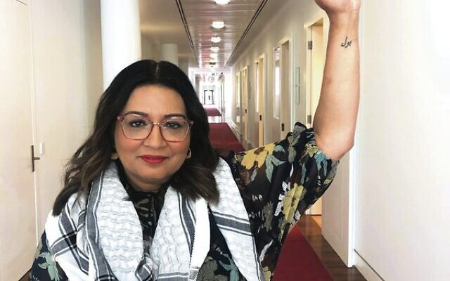 Greens Senator Mehreen Faruqi wore a keffiyeh "in solidarity with Palestinians" in Parliament last May. Photo: Facebook