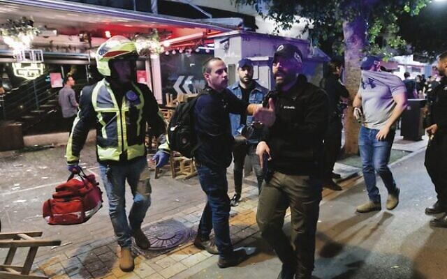 Police and rescue workers at the scene of the terror attack in Tel Aviv last week. Photo: Avshalom Sassoni/FLASH90