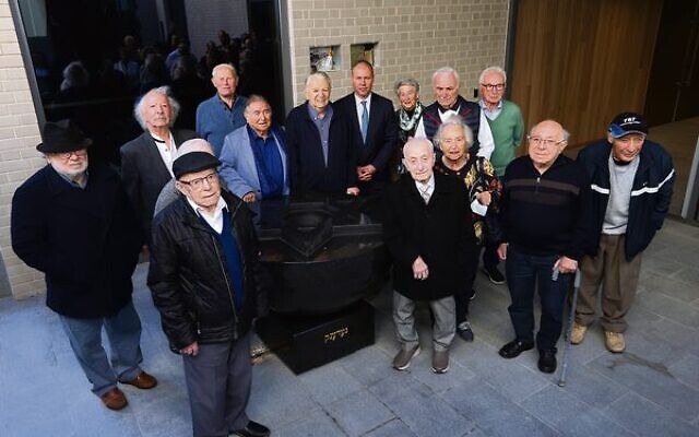 Federal Treasurer Josh Frydenberg at the new Melbourne Holocaust Museum with a group of survivors. Photo: Peter Haskin