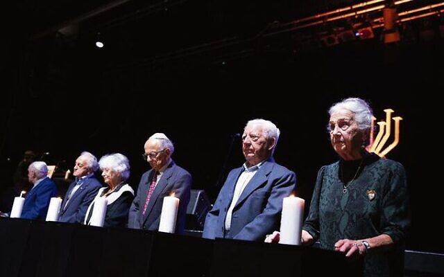 Holocaust survivors Jack Meister, Joe Symon, Ana and Gaby de Leon, Sam Young and Olga Horak lit the six candles in memory of the six million murdered Jews.