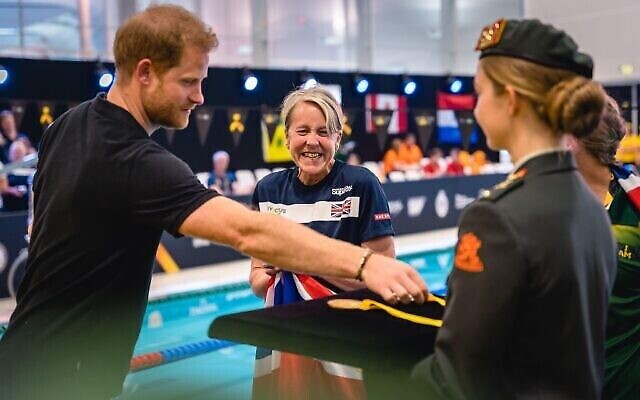 The Duke of Sussex with a British competitor during the swimming at the Invictus Games at Het Hofbad the Hague, Netherlands. Photo: Jewish News UK