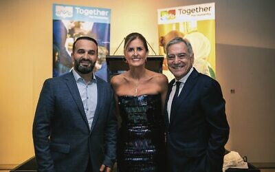 From left: Danny Abdallah, Together For Humanity CEO Diane Harapin and journalist John Mangos.